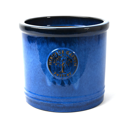 Tree emblem handcrafted into ceramic pot